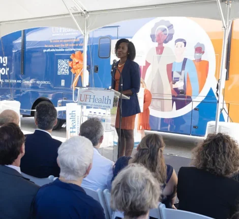 Woman speaking at press event