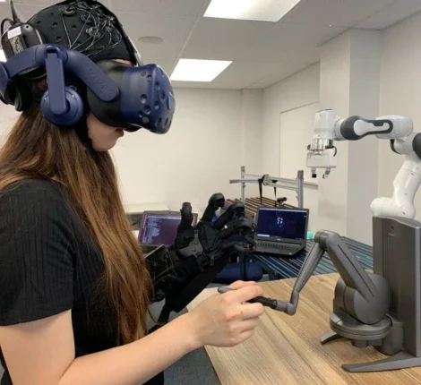 UF student performs space operations testing with machinery in lab